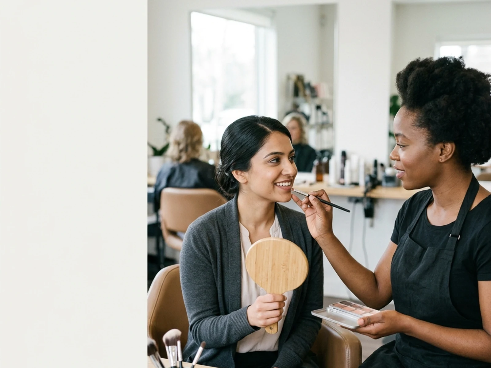 Makeup artist testing subtle shades during a bridal consultation